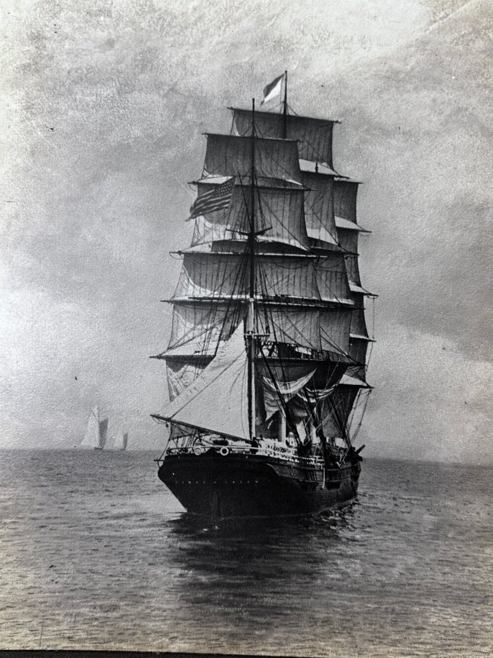 Three photographs, two of 19th century ships from New England